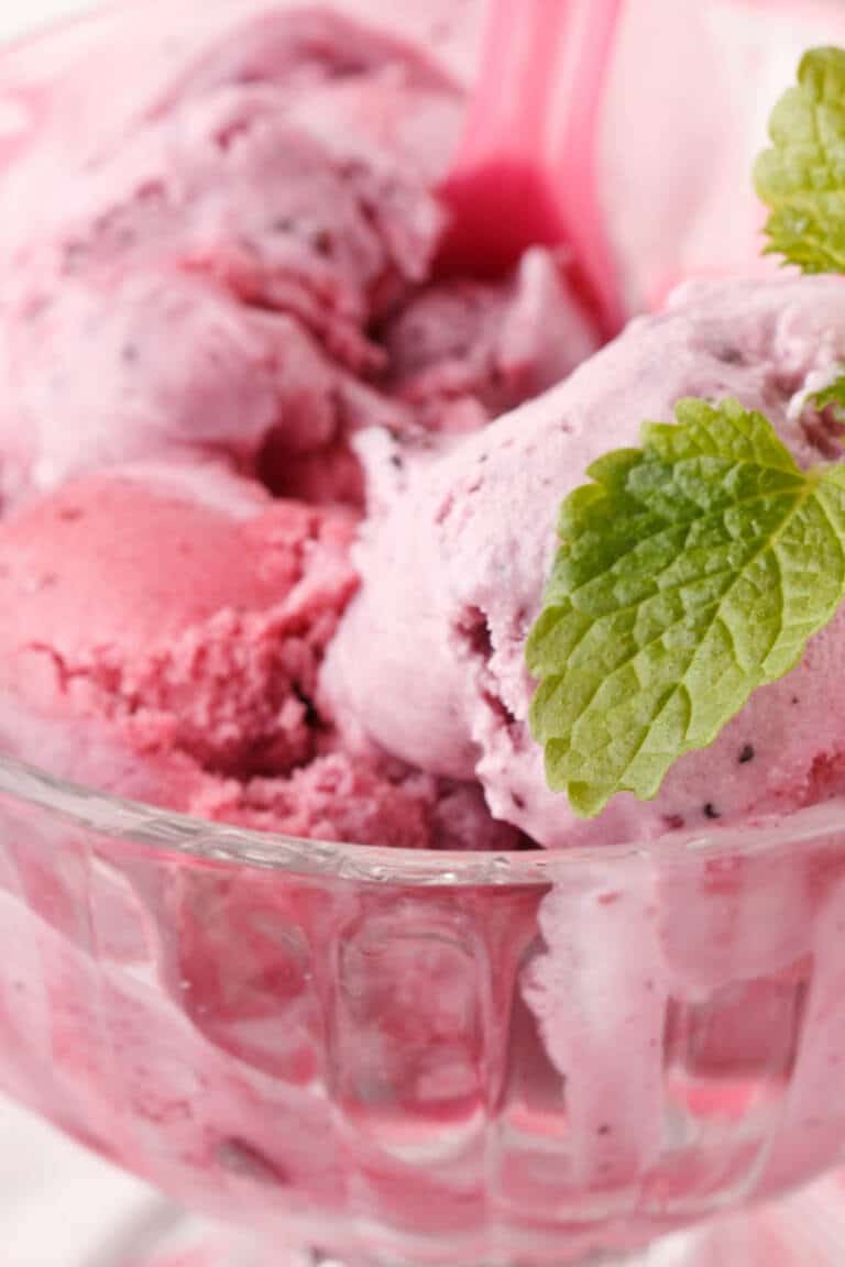 Strawberry Snow Ice Cream closeup in glass serving bowl