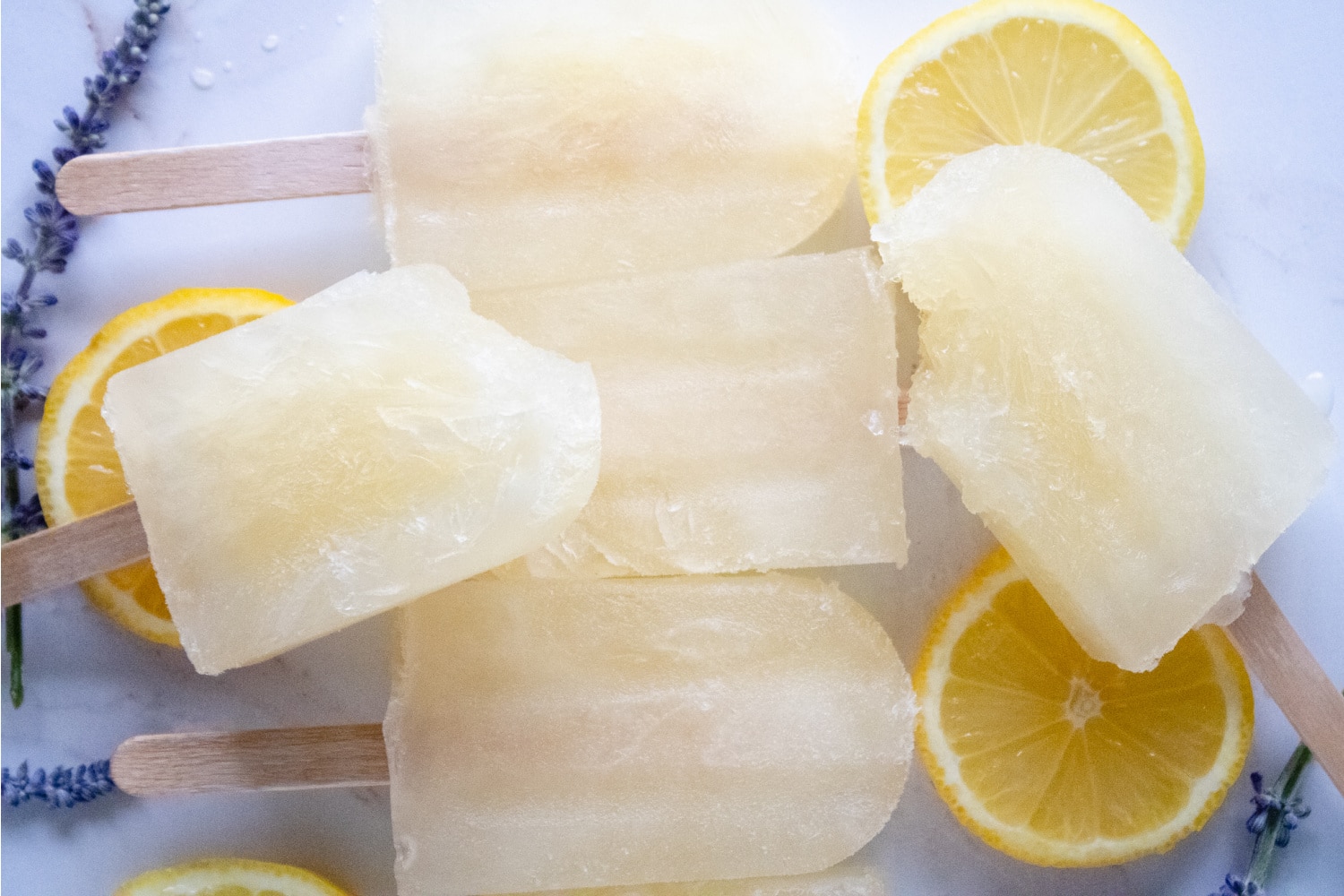 https://www.inspiringsavings.com/wp-content/uploads/2022/04/Lemon-Lavender-Ice-Pops.jpg