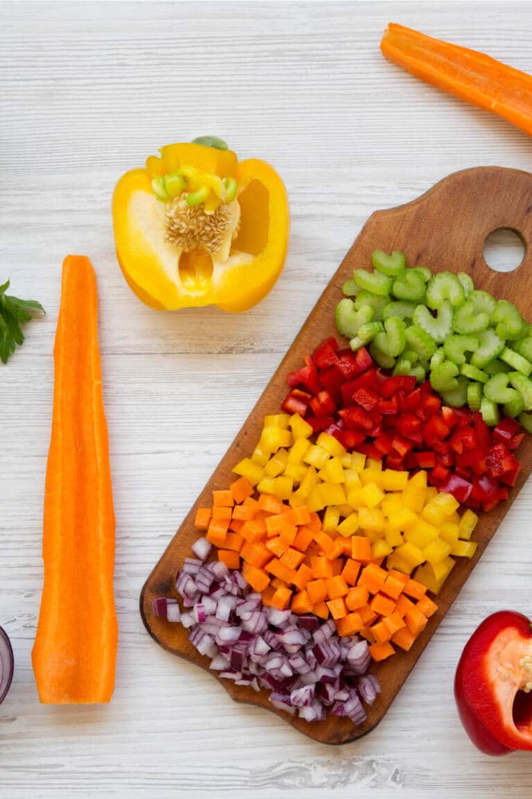 Chopped fresh vegetables on cutting board - meal prep ahead of time