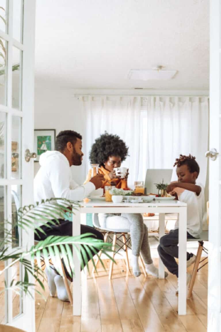 family eating together at dinner table