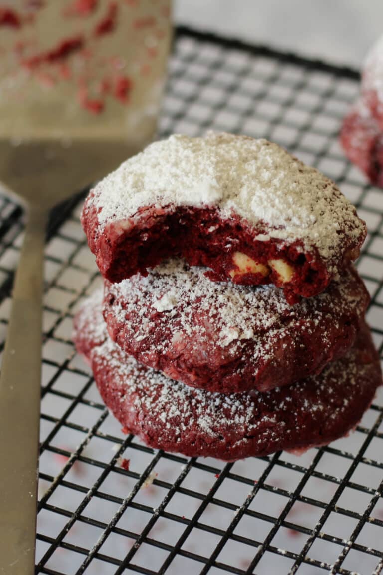 red velvet chocolate chip cookies on baking rack