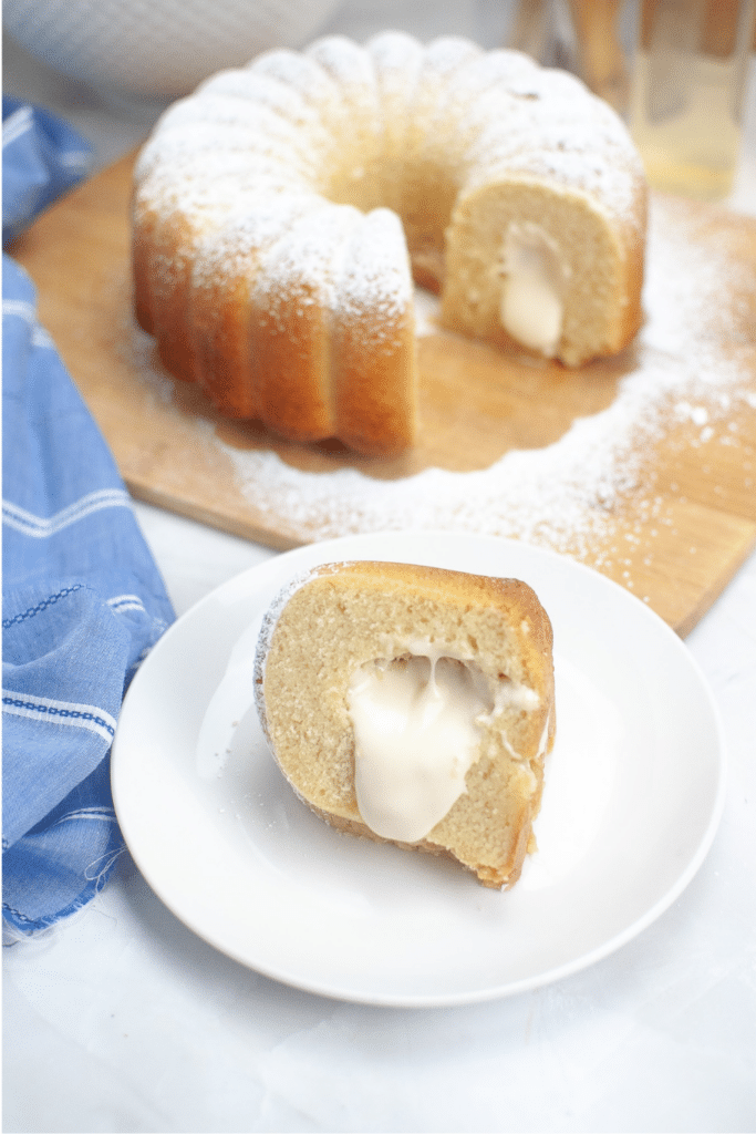 Twinkie bundt cake with slice missing ready to be served