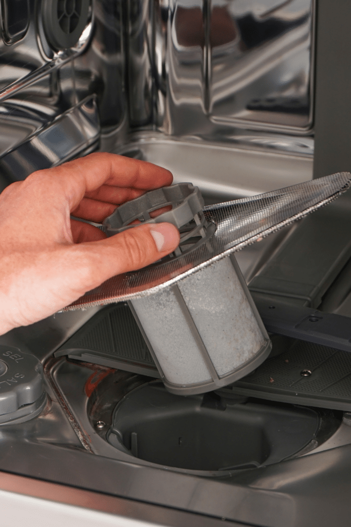 Cleaning kitchen dishwasher filter