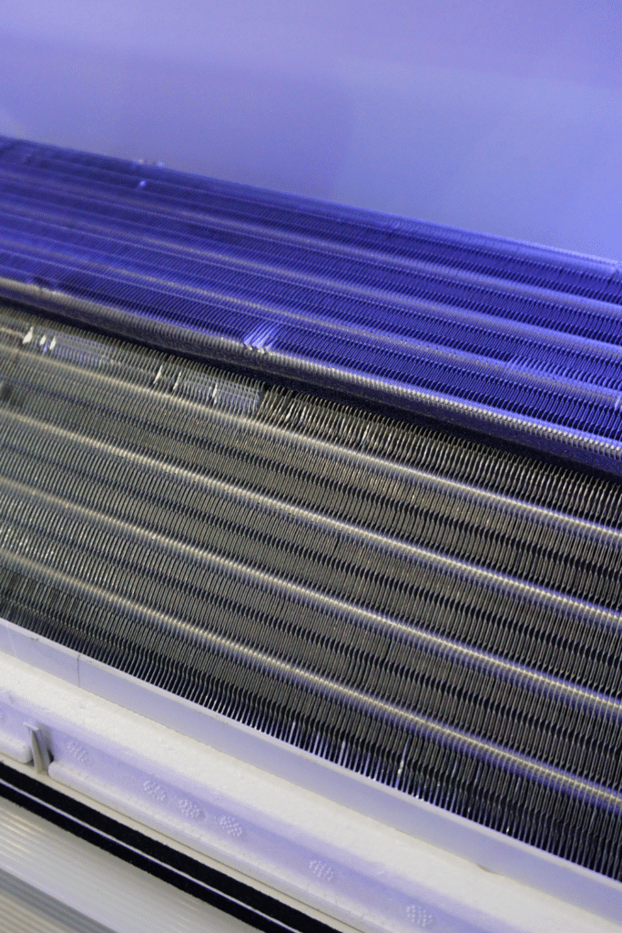 Cleaning refrigerator coils